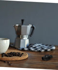 Rubber Steam Wand Cover For Espresso Makers With Heat Insulation Sleeve next to coffee set on table