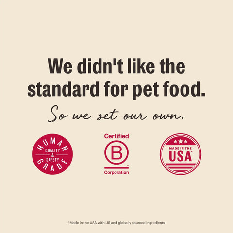 Image showing commitment to pet food standards with Human Grade certification and Made in the USA badge.