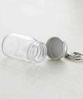 Top Tier 12 Pack 7 ml Mini Glass Bottle Keychains Featuring Secure Screw Lids And Heavy Duty Metal Rings, open with keychain.