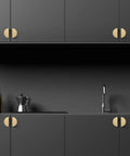 Solid Brass Cabinet Pulls 5 Pack Gold Half Moon Drawer Handles on black kitchen cabinets with brushed brass finish.