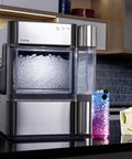 Front view of GE Profile Opal 2.0 nugget ice maker in stainless steel with clear ice bin and side water reservoir.