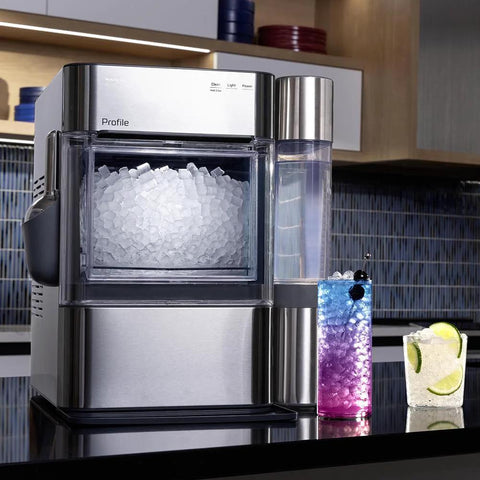 Front view of GE Profile Opal 2.0 nugget ice maker in stainless steel with clear ice bin and side water reservoir.