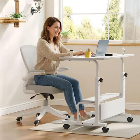 Height Adjustable Ergonomic Rolling Computer Desk With Storage Shelves Waterproof Portable Study Table Compact Multipurpose Workstation For Home Office Built Different Setup Smooth Roll Casters, woman using desk with laptop.