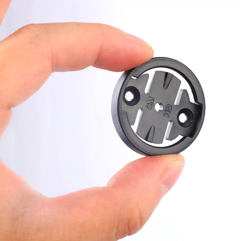 Person holding Gear Up With This 4 Pack Bike Mount Replacement Inserts for Out Front Cycling Computer Mounts, close-up view