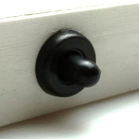 Rock Solid Cabinet Door Repair Kit With Heavy Duty Black Plastic Shutter Pins And Smooth Damper Replacement Springs, close-up of black plastic shutter pin.