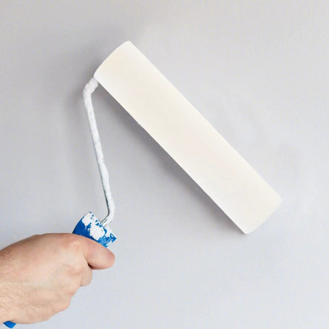 Heavy Duty High Density Polyurethane Sponge Paint Roller Set For Wall Painting And Housekeeping Or Auto Detailing in use on a wall.