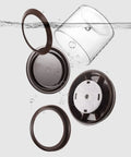 Round High Borosilicate Glass Coffee Bean Container With Real Deal Airtight Seal disassembled with lid and ring in water.