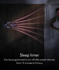 Hot And Cold Air Multiplier Space Heater And Fan With Jet Focus Technology in use near a sleeping person, illustrating quiet operation.