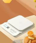 Digital Kitchen Scale With 11 Pound Capacity Dual LCD Display Tare Function And Precise Half Gram Resolution on kitchen table