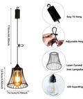 Three Pack Battery Operated Outdoor Chandelier Pendant Lights With Rustic Black Metal Bell Shade mounted with adjustable height.