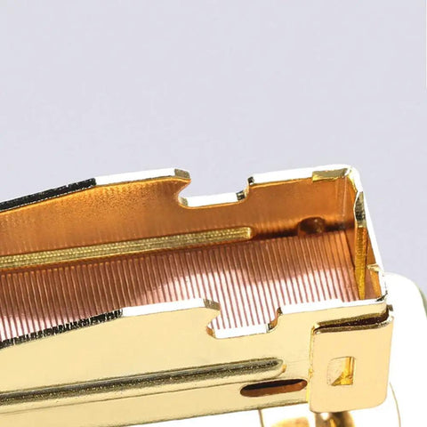 Close-up of a stapler loading rose gold staples from the Rose Gold Staples Refill Kit With 7000 Premium 26 By 6 Standard Size Staples