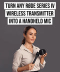Person holding Interview GO Handheld Adaptor For Wireless ME GO And PRO Transmitters in a studio setting
