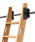 20 Ft Sliding Library Ladder Hardware Kit With Rock Solid Carbon Steel Track and Smooth Braking Casters, wooden ladder with black track connection.