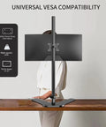 Tall Floor Monitor Mount With Extra Long 47 Inch Pole For Free Standing Desk Setup Adjustable Single Arm Fits 13 To 27 Inch Screens Up To 22 Lbs Easy Height Tilt And Depth Adjust To Cut Eye Strain shown on desk with monitor