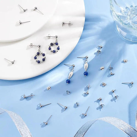 150 Pcs Ball Post Earring Kit With 75 Pairs Of 304 Stainless Steel Findings Including Loops And Ear Nuts 0.8mm Pin For DIY Earring Making No Tarnish Hypoallergenic Easy To Use, ball post studs with dangle earrings on blue and white display