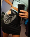Edgy Layered Belly Chain Made From Distressed Leather And Antique Alloy Links A Universal Fit worn over a black skirt.