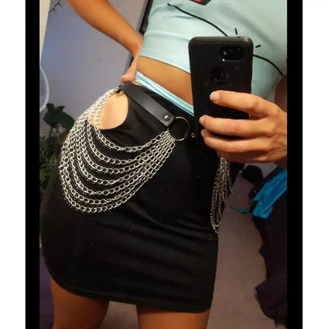 Edgy Layered Belly Chain Made From Distressed Leather And Antique Alloy Links A Universal Fit worn over a black skirt.