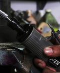 Close-up of Drill America SD-7 carbide burr in a die grinder; ball-end, double-cut, 3/4" dia, 1/4" shank.