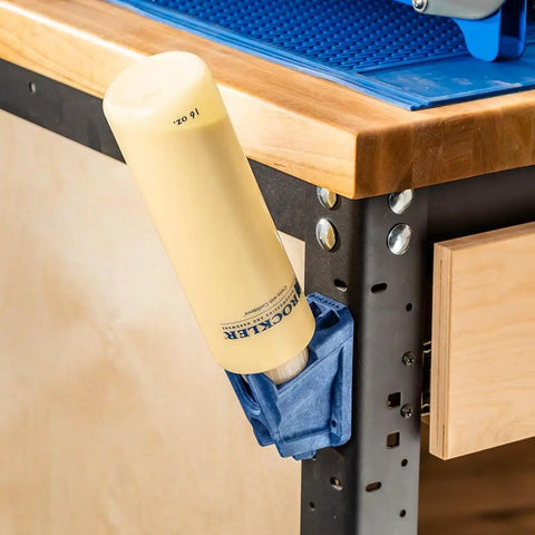 Upside Down Glue Bottle Dock Station With One Handed Access For 4oz 8oz And 16oz Bottles mounted on wooden workbench