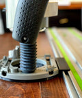 Guide Rail Adapter Fits Bosch 1617 Router converts plunge or fixed base to track saw system with black base and mounting bracket.