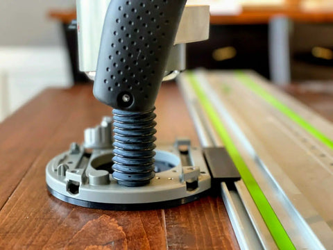 Guide Rail Adapter Fits Bosch 1617 Router converts plunge or fixed base to track saw system with black base and mounting bracket.
