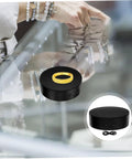 Compact Electric Rotating Turntable Stand For Jewelry Display with gold ring, black ABS show case holder on surface.