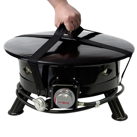 Carrying the smokeless 24 inch portable propane fire pit bowl with 58K BTU, self igniter, and carry straps for easy transport.