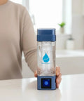 High-Concentration Hydrogen Water Bottle With Platinum-Coated Electrodes And PEM SPE Hydrogen Tech held in kitchen