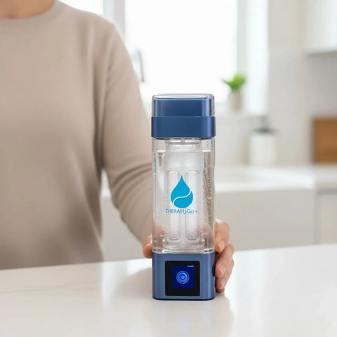 High-Concentration Hydrogen Water Bottle With Platinum-Coated Electrodes And PEM SPE Hydrogen Tech held in kitchen