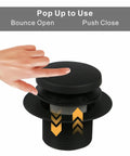 No Fuss Matte Black Tub Drain Kit With Overflow Tube Fitting Every Bathtub showing pop-up drain mechanism and hand usage.