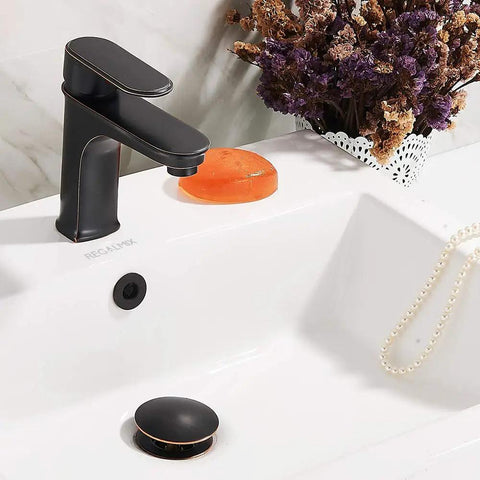 Vessel Sink Drain With Pop Up Stopper And Detachable Basket Strainer No Fuss Anti Clog Drain Assembly With Overflow Oil Rubbed Bronze Finish in modern sink