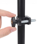 Close-up of a hand tightening a 10 Piece Super Grippy Black Wing Knob With 1/4-20 Threads on a T-Track system.