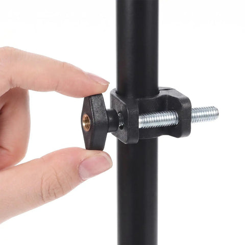 Close-up of a hand tightening a 10 Piece Super Grippy Black Wing Knob With 1/4-20 Threads on a T-Track system.