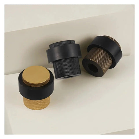 Stylish Knurled Brass Floor Mount Door Stopper With Non Magnetic Bumper Catch Holder To Block Doors And Protect Walls In Your Home displayed in three colors.