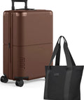 Front view of brown 21.5-inch hard-shell carry-on luggage with four spinner wheels and a black tote bag