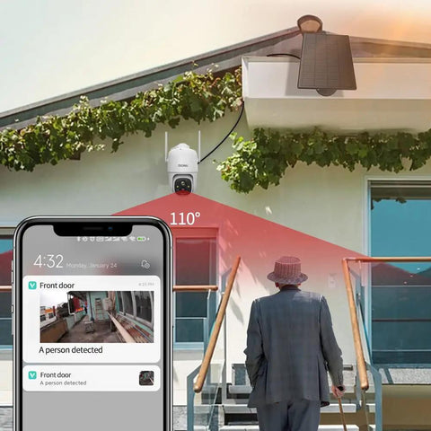 2K PTZ Solar WiFi Security Camera With AI Motion Detection installed above house entrance, smartphone showing detection alert.