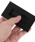 Person holding Black Aluminum Hidden Recessed Door Handles 2 Pack Concealed Cabinet Pulls For Furniture Doors And Drawers