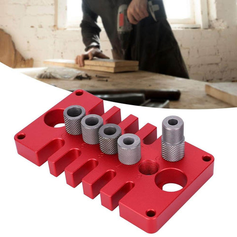Punch Positioner Dowel Jig 3-In-1 Drill Guide Block for Woodworking shown in red aluminum with positioning holes