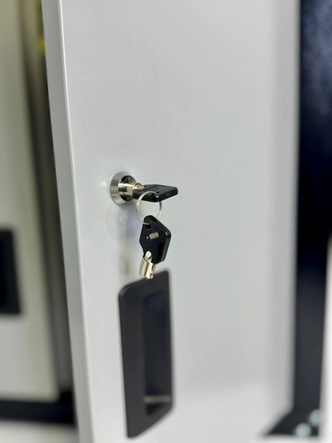 Close-up of HMC tubular lock with keys on Heavy Duty Steel Security Cabinet With 2 Adjustable Shelves Pre Drilled Holes And Mounting Hardware HMC Tubular Lock With 100 Combinations 66 Pound Frame Load 22 Pound Per Shelf Compact 12 Inch Depth