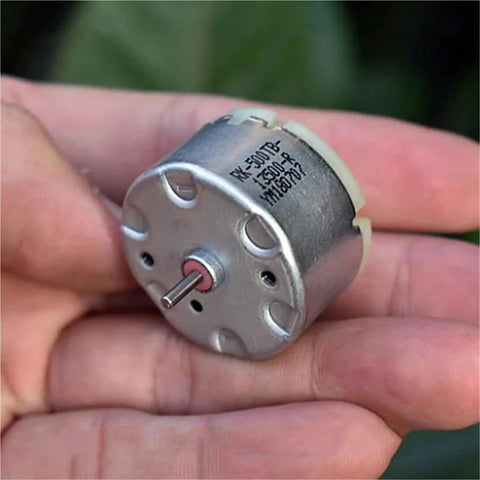 Mini 32mm Round Spindle Motor, DC 6V 9V 12V, 5600 RPM, held on hand for size reference