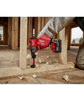 Knockout 1/2 Inch M18 Fuel Brushless Cordless Drill Driver packing serious torque working on wooden frame with precision