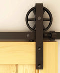 Close-up of heavy duty steel roller on 20Ft Heavy Duty Sliding Barn Door Hardware Kit For Smooth Quiet Operation With Big Spoke Wheel Hanger J Style Fits 120 Inch Door Panel Solid Steel Roller And High Strength Flat Tracks Supports Up To 150Kg Durable Anti Corrosion Construction.
