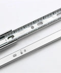 Three Section Drawer Slide Rail Set With Buffer Dampening Steel Ball Bearings for Silent Cabinet Doors, detailed metal close-up
