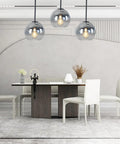 Dope Modern Black Globe Pendant Lights Two Pack, Glass Silver Gradient Orbs illuminating elegant dining room