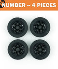 Four Piece Tech Wheels And Tires Set With 43.2x14mm Tires And 30x14mm Rims for RC cars, top view of black wheels.