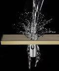 Built Tough Brushed 304 Stainless Steel Linear Shower Drain With Quick Release Hair Catcher 31.5 Inch Rectangular Floor Grate with water splashing.