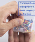 Hand holding a box of Colorful Bike Cable End Caps Set, Alloy End Crimps in Red Black Gold Silver Green Blue Purple Orange, 80 Pieces.