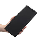 Hand holding Ultra Thick Espresso Tamping Mat For Large 5x12 Inch Coffee Bar Station Silicone Tamper Pad