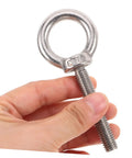 Heavy Duty Stainless Steel Eye Bolts M10x60 With Nuts And Washers, held in hand, showing eye design and threaded area.