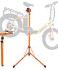 Heavy Duty E Bike Repair Stand Portable Foldable Workstand With 176 Lb Capacity shown with bike mounted, high-strength orange steel.